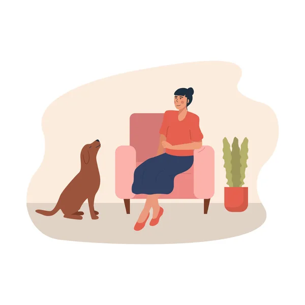 Glad husdjursägare sitter på fåtöljen och hennes hund tittar på henne. Kvinnan hemma med sitt husdjur. Söt leende ung flicka sitter på bekväm soffa. Tillbringa tid hemma med husdjur. Illustration. — Stock vektor