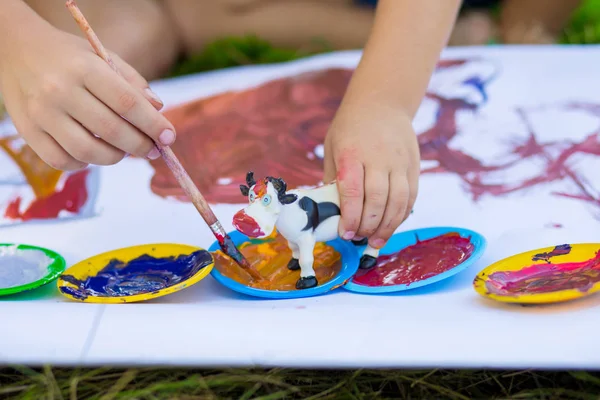 Children draw in summer park. Art concept