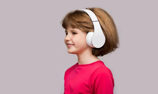Happy Smiling Child Enjoys Listens Music Headphones White Background — Stock Photo, Image