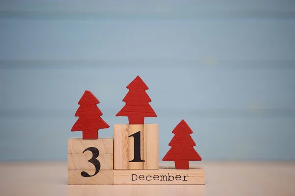 December 31. Day 31 of december month, calendar on blue background. Winter time. New year concept