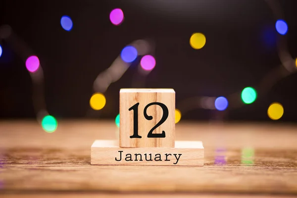 Calendario Madera Primer Plano Con Palabras Enero Sobre Fondo Oscuro — Foto de Stock