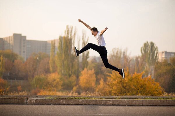 Man run at autumn morning. Healthy lifestyle concept