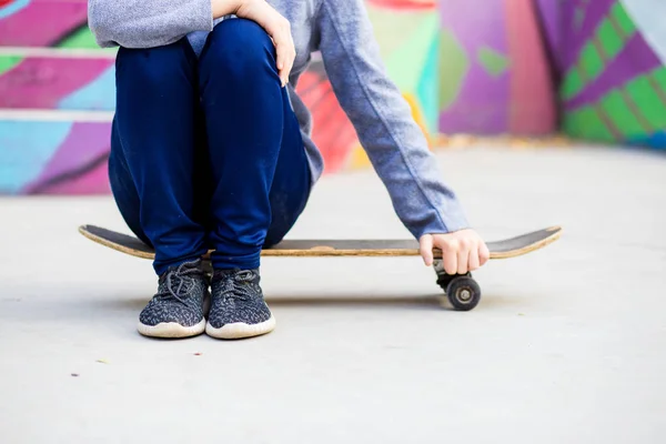 Longboard girl on street at beautiful summer evening, long board. Lifestyle concept