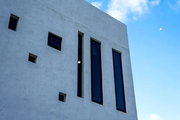 RAYONG - 6 May 2018 : Architecture of modern townhouse There are multiple channels for lighting at Pararesort Thailand. with blues sky above it.