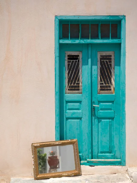 Colorful door with mirror in Milos Island — Stock Photo, Image