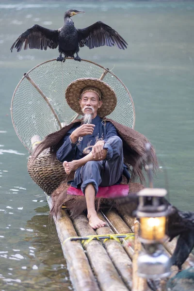 Cormorant fisherman — Stock Photo, Image