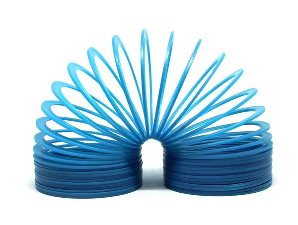 Blu Slinky Giocattolo Isolato Sfondo Bianco — Foto Stock