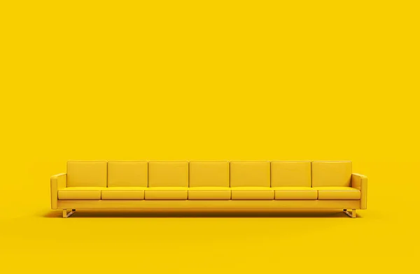 Extremely long yellow leather sofa isolated on yellow background