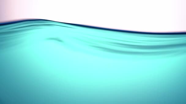 A pure blue wave of water, with a moderate, calm swing, a symbol of purity, freshness and ecology. Close-up. — Stock Video