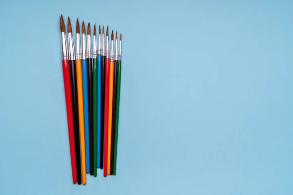 Paint brushes. Conceptual and creative photography. Copy space. — Stock Photo, Image