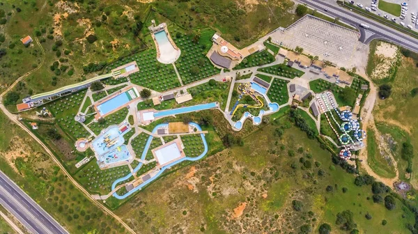 Aerial drone view of water park swimming pools on a summer day. Close-up. — Stock Photo, Image