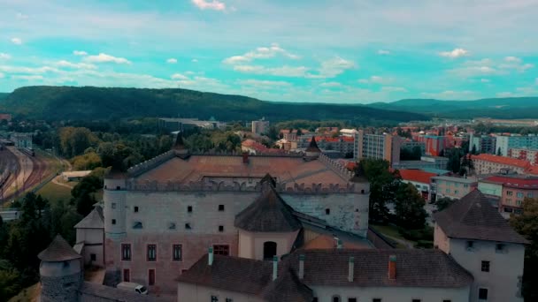 Aerial view of castle in slovak town Zvolen surrounded by mountains. — Stock Video