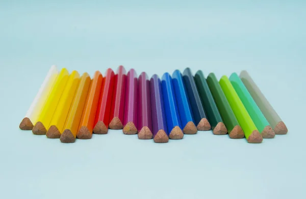 Crayons Colorés Sur Papier Bleu — Photo