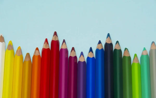 Crayons Colorés Sur Papier Bleu — Photo