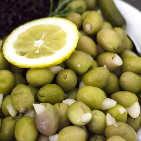 Green olives without seeds, stuffed with the garlic cloves