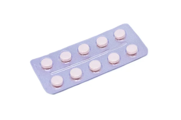 Pink pills in a package isolated on a white background — Stock Photo, Image