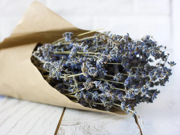 Bouquet of dried lavender in a brown wrapping paper