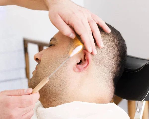 Turkish Barber Ear Hairs Removal Burning Fire Stock Photo by ©Yannamelissa 227942814 Turkish Barber Ear Hairs Removal Burning Fire Stock Photo by ©Yannamelissa 227942814
