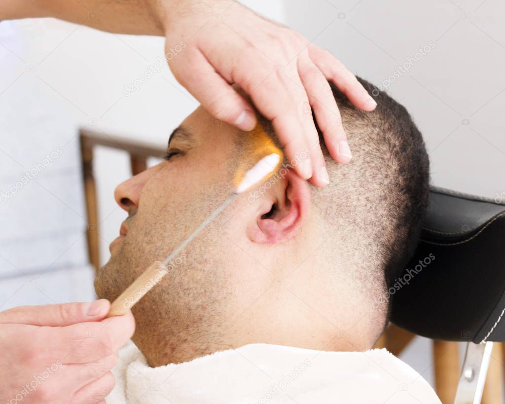 Turkish barber ear hairs removal by burning fire