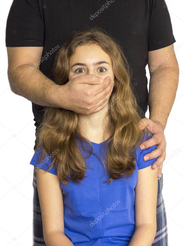 Child abuse, violence in family. Man shuts girl mouth with his hand