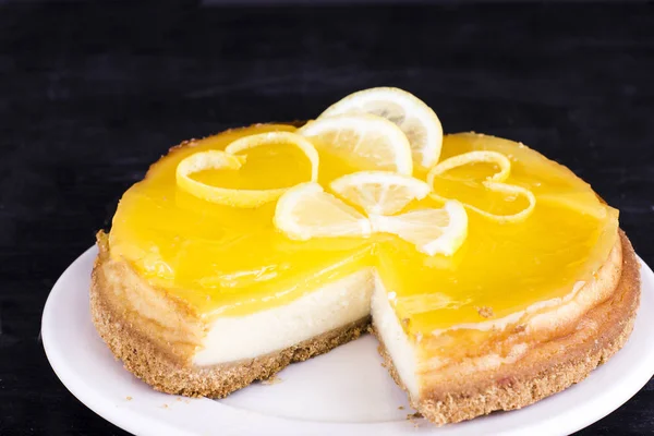 Lemon Cheesecake Black Background Decorated Lemon Zest Close — Stock Photo, Image