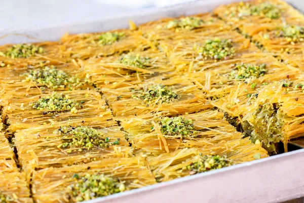 Traditional Turkish baklava sweets in the open buffet in a hotel in Turkey