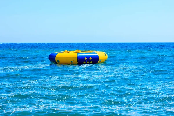 Large rubber ring in the sea. Fun in the Mediterranean — Stock Photo, Image