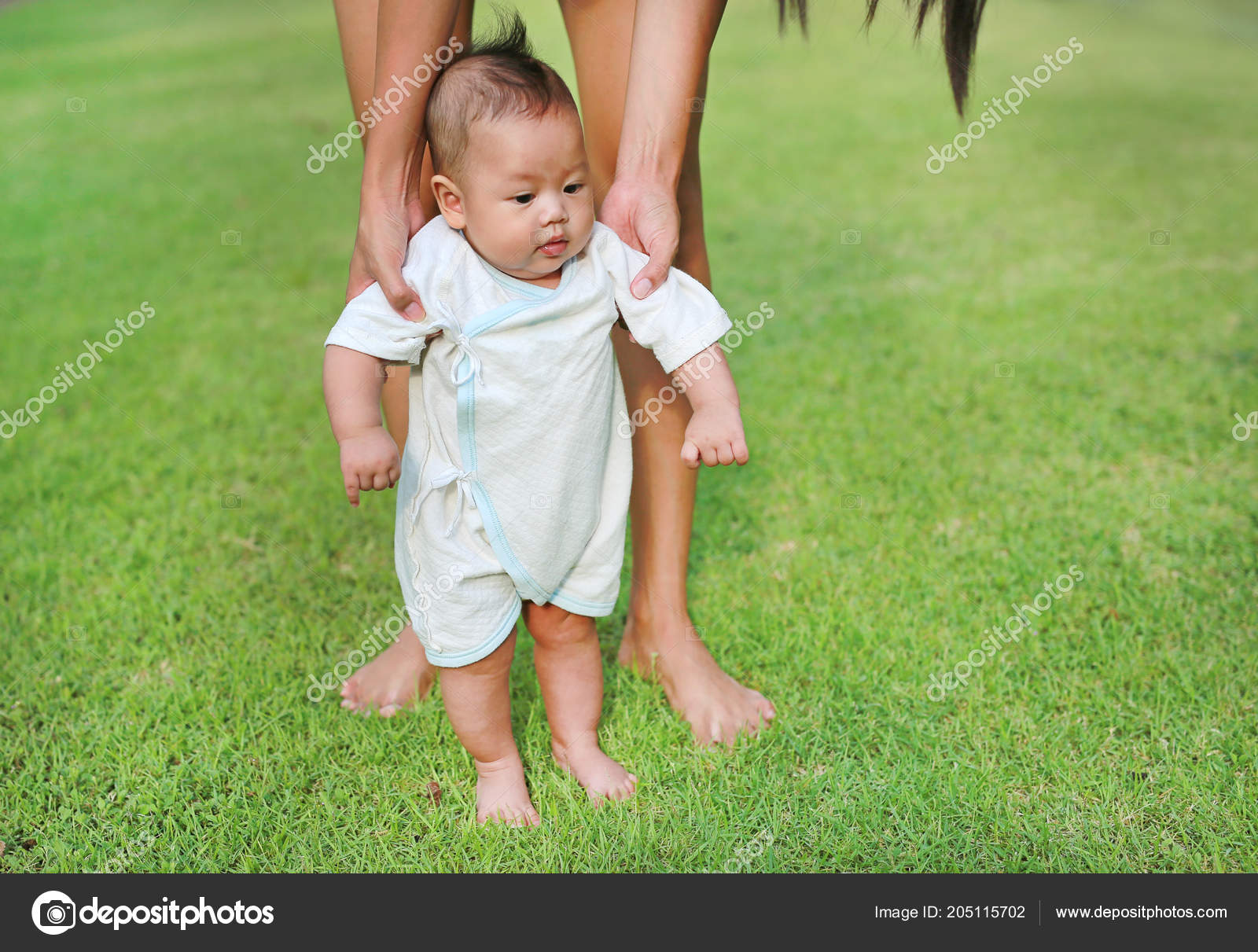 infant learning to walk