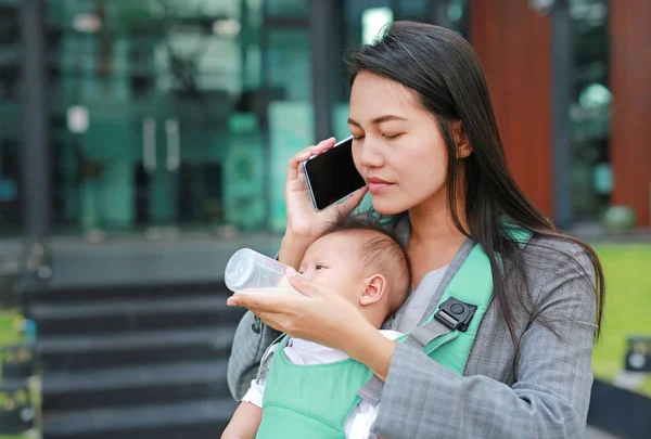 Business Woman Talking Telephone Carrying Infant Baby Boy Holding Her — Stock Photo, Image