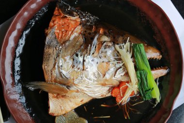 steamed salmon head with soy sauce (salmon kabutoni) clipart
