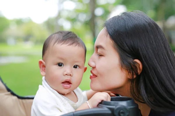 Close Asian Mother Her Baby Boy Trolley Park — Stok Foto