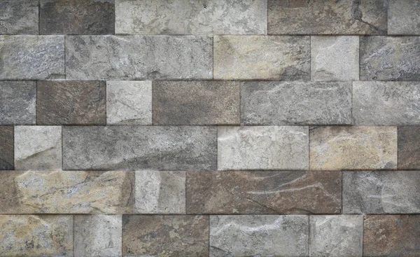 近代的なグレーの石のタイルのテクスチャレンガの壁をクローズアップ — ストック写真