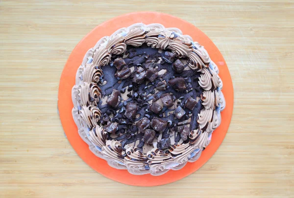 Chocoladecake Houten Bord Achtergrond Bovenaanzicht — Stockfoto