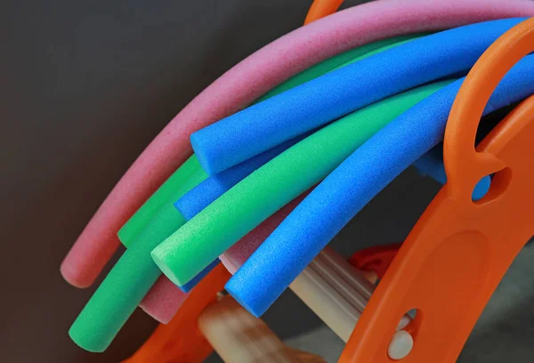 Water aerobic equipment. colored aqua noodles