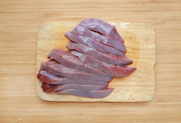 Raw Fresh Sliced Pork Liver Wooden Board Background — Stock Photo, Image