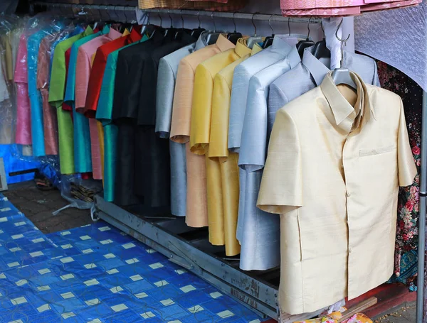 Thai silk suit hanging in shop