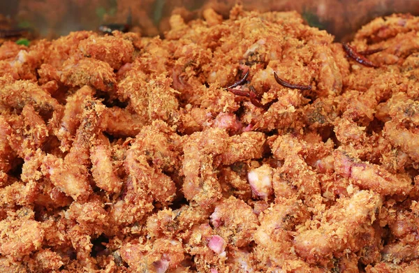 Crispy fried pickled fish at the local market in Thailand.