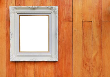 Resminiz için boş alana sahip antika beyaz fotoğraf çerçevesi veya ahşap tahta duvar arka planına yerleştirilen metin.