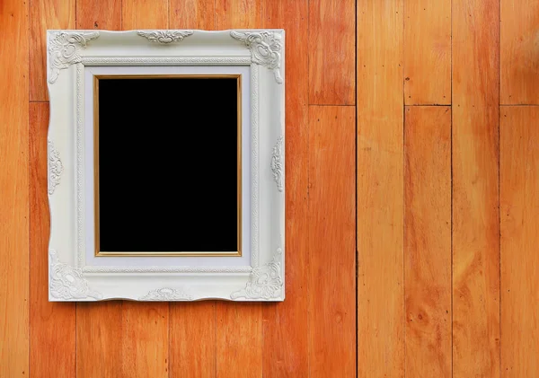 Resminiz için siyah boş alana sahip antika beyaz fotoğraf çerçevesi veya ahşap tahta duvar arka planına yerleştirilen metin.