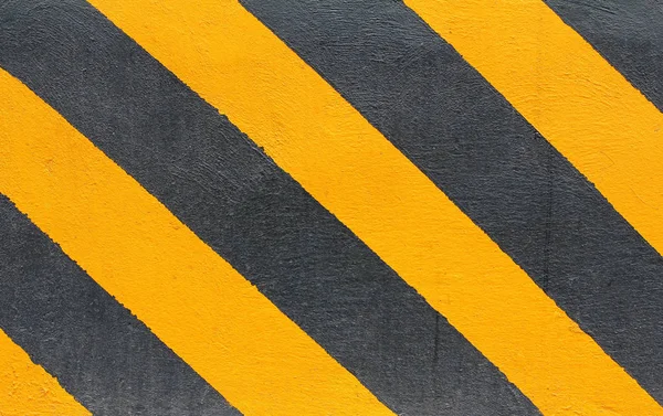 Black and yellow hazard lines with grunge effects