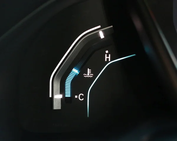 Digital temperature gauge in car dashboard