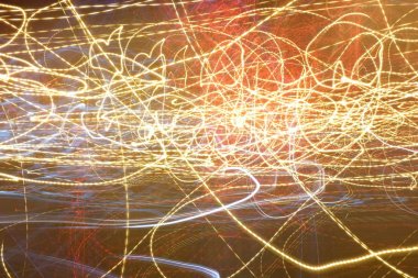 Karanlık arka planda soyut rasgele ışık.