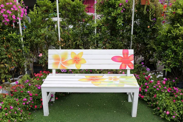 White bench in the garden - Wooden Bench in the garden