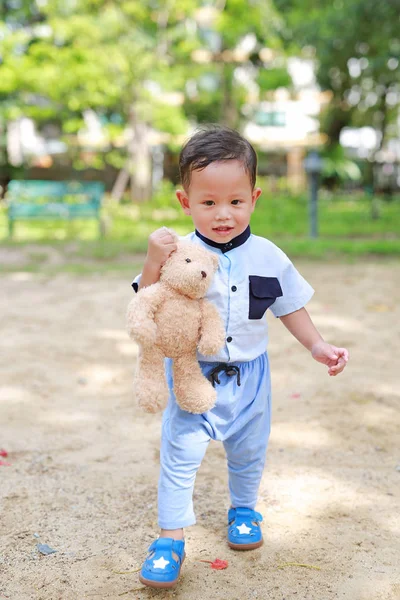 Happy Toddler Boy Walking Holding Teddy Bear Park Outdoor — Stock Photo, Image