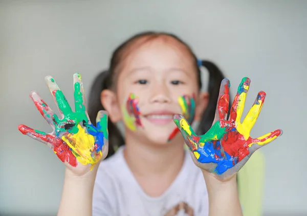 Happy Little Asian Girl Her Colorful Hands Cheek Painted Children — Stock Photo, Image