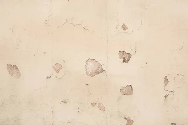 セメント壁の表面に塗料を剥離 — ストック写真