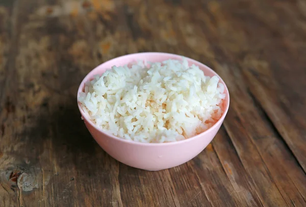 Arroz Jazmín Plato Rosa Sobre Mesa Madera — Foto de Stock