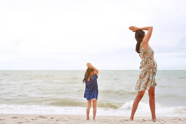 Mother Her Child Doing Yoga Exercises Beach Rear View — Stock Photo, Image