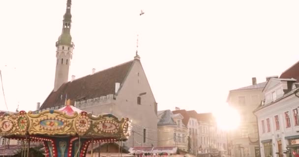 Tallinn, Estonia - December 22, 2017: Traditional Christmas Holiday Carousel And Christmas Market In Old Town Hall Square. Famous Landmark And UNESCO World Heritage Site — Stock Video