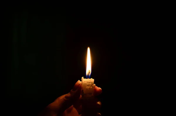 wax candle flame in the dark